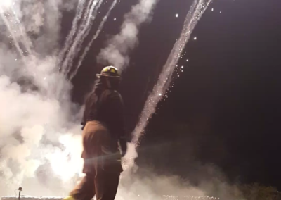 Fireworks crew member in action